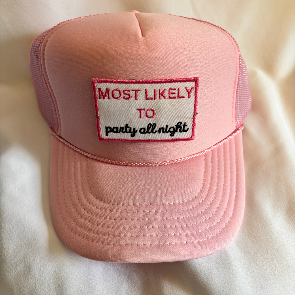 Pink cap with a patch on a light-colored fabric background