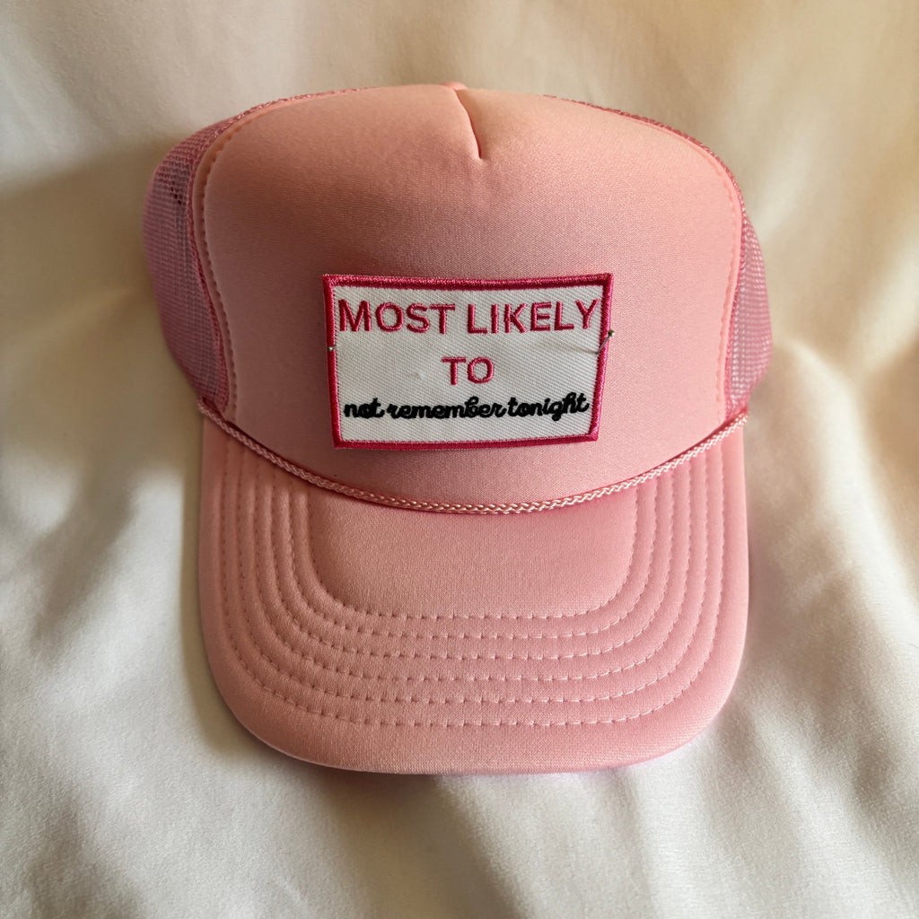 Pink cap with a patch on a light-colored surface